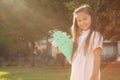 Lovely little Asian girl at the park on a summer day Royalty Free Stock Photo
