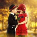 Lovely little boy giving a rose to girl Royalty Free Stock Photo