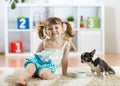 Lovely little child girl and her pet dog Royalty Free Stock Photo