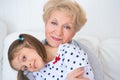 Lovely little girl with her grandmother Royalty Free Stock Photo