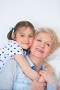 Lovely little girl with her grandmother Royalty Free Stock Photo