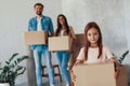 Adorable family of three people moving to new house