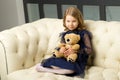 Lovely little girl hugging her teddy bear toy Royalty Free Stock Photo