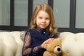 Lovely little girl hugging her teddy bear toy Royalty Free Stock Photo