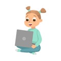 Lovely Little Girl Sitting on Floor with Crossed Legs Using Laptop Computer, Online Education or Course, Kid Programmer Royalty Free Stock Photo