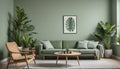 This lovely modern living room has a monochromatic sage-green wall Royalty Free Stock Photo