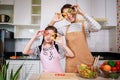 A lovely moment of mother and kid preparing healthy food and having fun