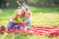 Lovely mother with their daughter having fun