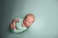 Lovely newborn baby boy sleaping confort pose