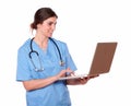 Lovely nurse with stethoscope using a laptop Royalty Free Stock Photo