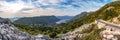 Lovely panorama of Montenegro, city of Kotor and bay from mountain road. Beautiful mountains of Montenegro at sunset.