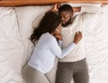 Lovely pregnant couple sleeping together at home Royalty Free Stock Photo