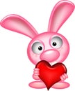 Lovely rabbit holds love heart