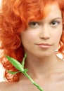 Lovely redhead with bamboo Royalty Free Stock Photo