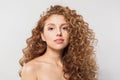 Lovely redhead woman with long healthy wavy red hairstyle. Natural beauty without retouching. Beautiful curly hair model Royalty Free Stock Photo