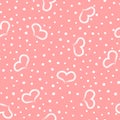 Lovely romantic seamless pattern. Repeated hearts and round dots drawn by hand.