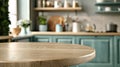 The lovely round wood tabletop counter is empty and on a bright and clean kitchen background. It is ready for display Royalty Free Stock Photo