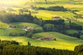 Lovely rural countryside in beautiful sunlight. Pasture landscape with barnyards.