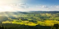 Lovely rural countryside in beautiful sunlight. Pasture landscape with barnyards.