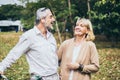 Lovely senior elderly happy couple man and woman with big laughing in romantic moment. Warm heart marriage and lover bonding and r Royalty Free Stock Photo