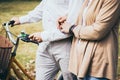 Lovely senior elderly smiling couple man and woman with happy hug or embrace in romantic moment. Warm heart marriage and lover bon Royalty Free Stock Photo