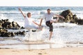 Lovely senior mature couple on their 60s or 70s retired walking happy and relaxed on beach sea shore in romantic aging together Royalty Free Stock Photo