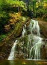 Mountain Waterfall In Autumn