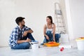 Lovely smiling happy couple painting new home Royalty Free Stock Photo