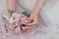 Lovely Soft Pink Flowers In Girl Hand On Nature Background