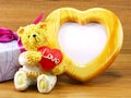 Lovely teddy brown bear and red heart shape