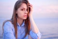 Lovely teenage girl with pleasant pensive look. Royalty Free Stock Photo