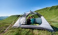 Lovely two people resting in camping at Carpathian mountains Royalty Free Stock Photo