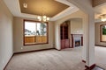 Lovely unfurnished living room with carpet. Royalty Free Stock Photo