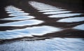 Lovely unusual abstract landscape image of wake and ripples caused by boat on Ullswater in Lake District