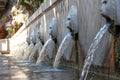 Lovely lion head fountains in a cozy village Spili in Crete, Greece.