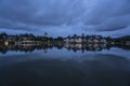 Lovely view of the lake near luxurious tropical resort over cloudy sky Royalty Free Stock Photo