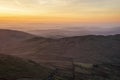 Lovely Winter landscape view from Red Screeds across misty layers of mountains towards the East