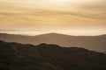 Lovely Winter landscape view from Red Screeds across misty layers of mountains towards the East Royalty Free Stock Photo