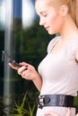 Lovely woman with cell phone Royalty Free Stock Photo