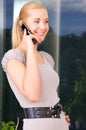 Lovely woman with cell phone Royalty Free Stock Photo