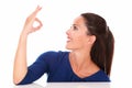 Lovely woman making an ok sign Royalty Free Stock Photo