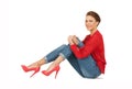 Lovely woman in red blouse and jeans Royalty Free Stock Photo