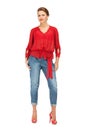 Lovely woman in red blouse and jeans Royalty Free Stock Photo