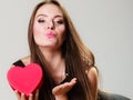 Lovely woman with red heart shaped gift box Royalty Free Stock Photo