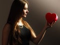 Lovely woman with red heart shaped gift box Royalty Free Stock Photo