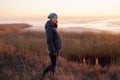 Lovely woman watching sunset in the nature Royalty Free Stock Photo