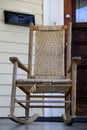 Lovely wood rocking chair on front porch Royalty Free Stock Photo