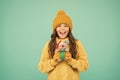 It is so lovely. xmas shopping and preparation. happy girl with christmas toy. small kid in warm clothes hold gift Royalty Free Stock Photo