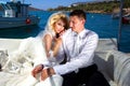 The lovely young couple beautiful woman from handsome man relating to the beautiful Greek Royalty Free Stock Photo