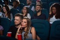 Lovely young couple on a date at the cinema Royalty Free Stock Photo